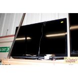 A Toshiba flat screen television with remote contr