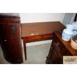 A 19th Century mahogany side table fitted with a s