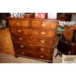 A walnut chest of two short and four long drawers