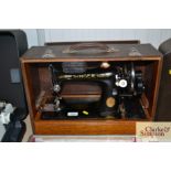 A Singer hand sewing machine