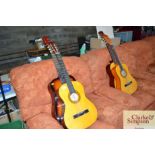 Four acoustic guitars