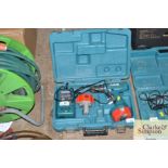 A Makita cordless drill in fitted case with batter