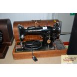 A Singer sewing machine - sold as collector's item