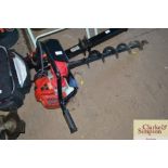 A Neilson petrol hand held post hole borer