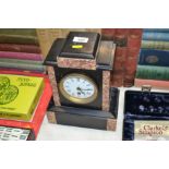 A slate and marble single hole mantel clock