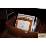 A box of miscellaneous pictures prints and frames