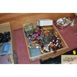 A box of various costume jewellery