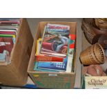 A box of car related books