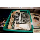 A tray box containing various pictures and ephemer