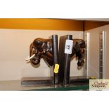 A pair of hardwood elephant book ends