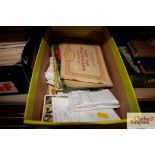 A box of cigarette trade cards and albums