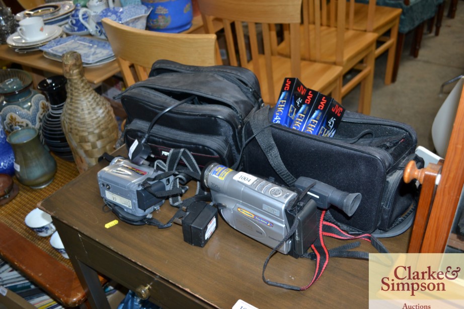 Two camcorders with carry bags