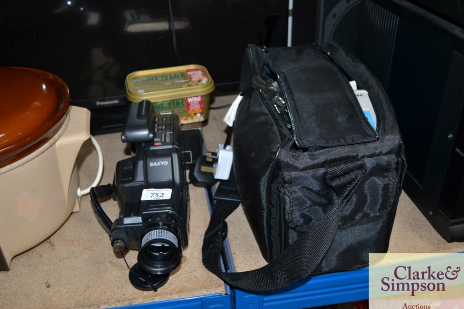 A Sanyo camcorder with carry bag and accessories