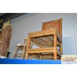 A child's bamboo chair and a dolls chair