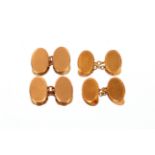A pair of 18ct gold cuff-links, 8.3gms; and a pair of 15ct gold cuff-links, 12.5gms