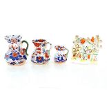 A set of three 19th Century Masons ironstone graduated jugs, decorated in the Imari pattern; and a