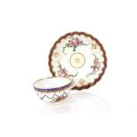 An 18th Century Worcester tea cup and saucer, decorated flowers and ho ho birds AF; a similar period