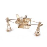 A Chinese silver plated novelty cruet set, in the form of a sedan chair and attendant figures with