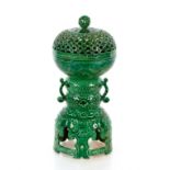 A finely potted Chinese censer cover and stand, with all over hand carved designs under a bright