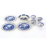 Eight pieces of early 19th Century English blue and white pottery, to include chestnut basket and