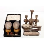 A cased pair of silver backed hair brushes; various other silver dressing table items; a pair of