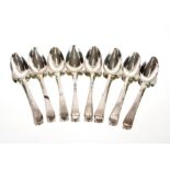 A set of eight George III silver feather edge teaspoons, London 1814