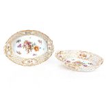 A pair of Dresden porcelain oval baskets, with floral spray decoration and pierced borders,