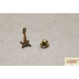A 9ct gold charm and a 14ct gold heart
