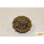 A yellow metal and diamond set mourning brooch, 11