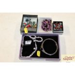 A collection of miscellaneous costume jewellery to include bangles, necklaces etc.