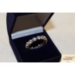 A white metal and crystal eternity ring