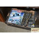 A box of aircraft related magazines and videos