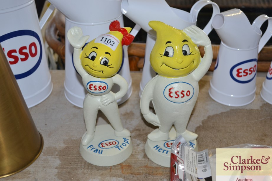 A pair of reproduction Esso money banks