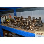 A collection bronze resin figures and a ships styl