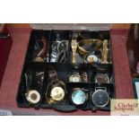A box of various wrist watches