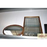 A framed bevel edged wall mirror with extra decora