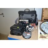 A portable CD player, Pentax camera and Panasonic