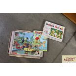 Two vintage jigsaws and a Rupert annual