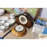 An oak three hole mantel clock together with a bar