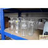 A large quantity of glass storage jars