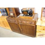 A carved oak sideboard