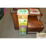 A Ladybird decorated chest of narrow proportions fitted seven drawers
