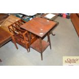 A mahogany two tier side table