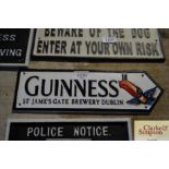 A reproduction "Guinness" plaque