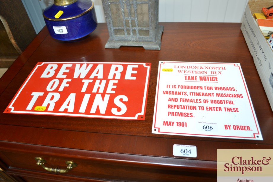 A reproduction "Beware of The Train" sign; and ano