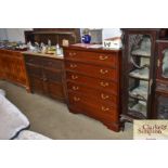 A mahogany effect chest fitted five long drawers