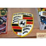 A reproduction Porsche plaque