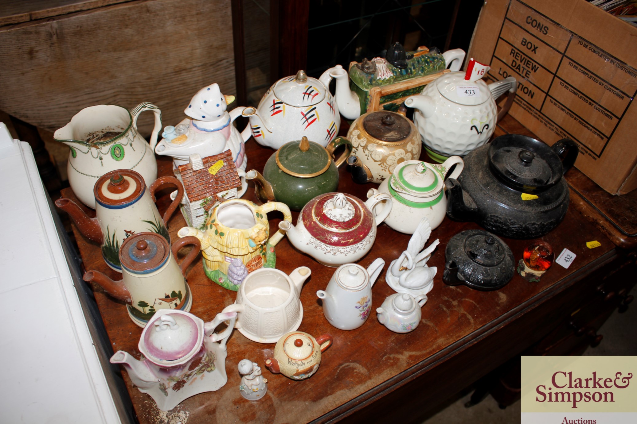 A quantity of various novelty and other teapots, c