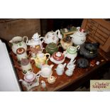 A quantity of various novelty and other teapots, c
