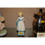 A Royal Worcester figure "Mondays Child Is Fair Of